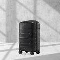 Black polypropylene cabin trolley suitcase with 8 wheels and telescopic handle
