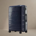 Large check-in trolley with 8 wheels, navy hard-shell suitcase with vertical panel design