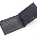Black bi-fold leather wallet with card slots and center fold seam, interior view.
