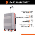 Small cabin suitcase with 8 wheels, grey PP shell, telescopic handle, close side view.
