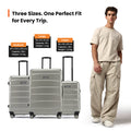 Silver hardside cabin suitcase with telescopic handle and smooth-rolling wheels
