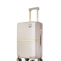 Beige hard-shell polycarbonate trolley suitcase with telescopic handle and spinner wheels