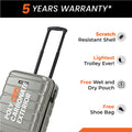 Silver small cabin suitcase close-up with telescopic handle and textured shell panels