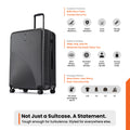 Charcoal grey ribbed check-in suitcase with upright handle and four wheels.