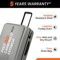 Light gray hard-shell check-in suitcase side with scratch-resistant shell and handle base
