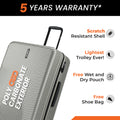 Silver ribbed check-in suitcase with side zipper and upright handle.