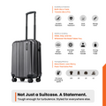 Dark grey hard-shell rolling suitcase with telescopic handle and four wheels.