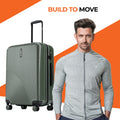 Dark green ridged check-in suitcase with top handle and 8 spinner wheels