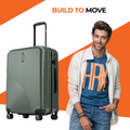 Green suitcase with telescopic handle and 8 wheels, ribbed shell.