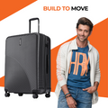 Charcoal hard-shell suitcase with ridged texture, telescopic handle, and spinner wheels.