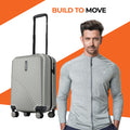 Silver grey small cabin suitcase with 8 wheels and telescopic handle, ridged shell