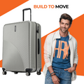 Hard-shell silver spinner suitcase with upright handle and wheels