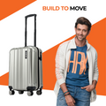 Small cabin suitcase in silver with side profile, telescopic handle, and caster wheels