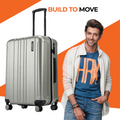 Hard-shell medium suitcase in dark silver with vertical ribbing and side carry handle, 4 wheels