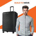 Large check-in suitcase in black with ridged shell and 8 wheels.