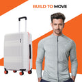 Small cabin suitcase, light gray shell with red trim, 8-wheel and side panel view.