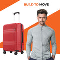 Red small cabin suitcase with telescopic handle and 8 wheels, shown beside a man