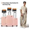 Pink cabin suitcase and other sizes, ribbed hard shell, shown with traveler