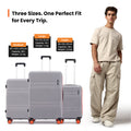 Light gray small cabin suitcase with telescopic handle and 8 spinner wheels, hard shell
