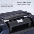 Hard-shell trolley luggage textured trolley handle with comfort-grip shape and buttons.