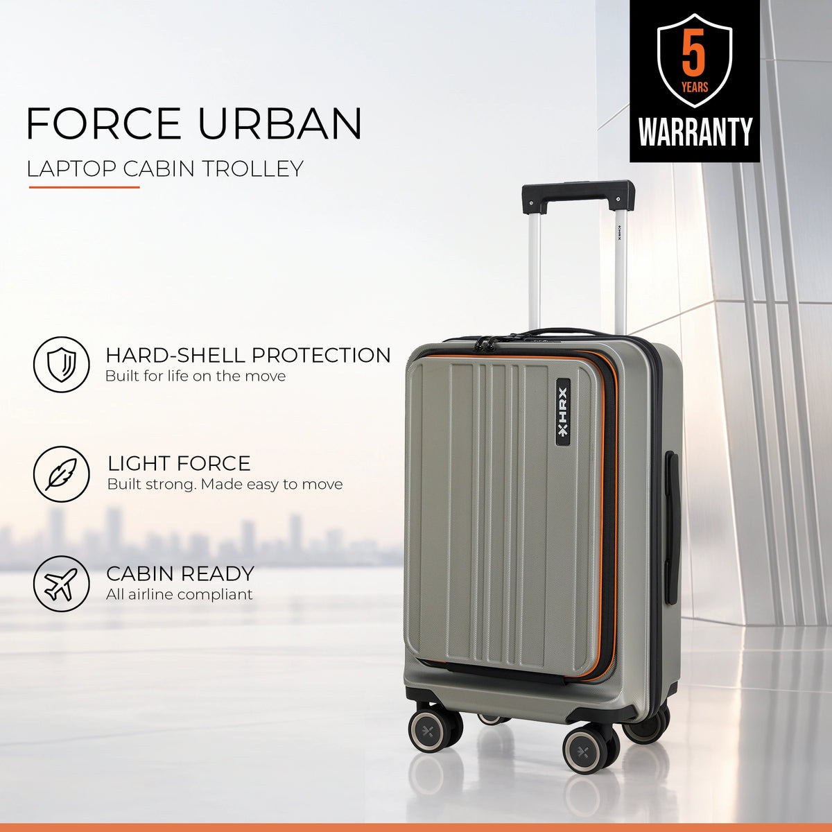 HRX hard-shell laptop cabin trolley, light gray with orange trim, upright on wheels