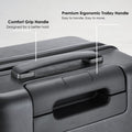 Dark grey hard-shell trolley with ergonomic handle and front carry grip