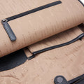 Black leather backpack interior back wall with zipper pocket and snap strap