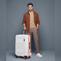 HRX medium check-in suitcase, white polycarbonate shell with 8 wheels and top grip