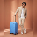 Small cabin suitcase, blue polypropylene with 8 spinner wheels and side handle