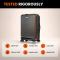 Black commute trolley suitcase with orange piping and 4 spinner wheels