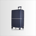 Navy hard-shell trolley suitcase with telescopic handle and four spinner wheels