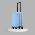 Light blue small cabin suitcase with black handle and four spinner wheels