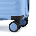 Blue suitcase corner with black caster wheels and sturdy frame