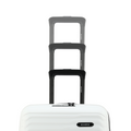 Stacked white cabin suitcases with black handles, top view of three sizes