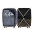 Peach suitcase open with inner compartments, cross straps, and 8 wheels.
