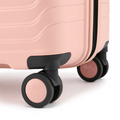 Peach small cabin suitcase with black handle and multi-direction wheels detail