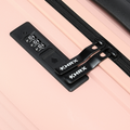 Black lock and strap panel on peach small cabin suitcase