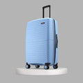 Large check-in suitcase, light blue, 8-wheel spinner with raised handle