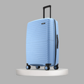 Blue medium check-in suitcase angled view with ridged shell and four double wheels