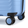 Light blue suitcase with two front spinner wheels and molded base for mobility