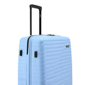 Blue hard-shell luggage with side handle, front vents, and ribbed shell