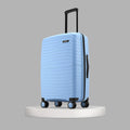 Blue hardshell check-in suitcase with upright handle and four-wheel base