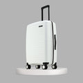 White hardshell check-in suitcase with upright handle and side grip handle