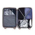 Medium check-in suitcase open interior with blue jeans panel and elastic tie straps.