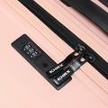 Pink medium check-in suitcase zipper with combination lock and HRX pull tabs