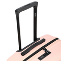 Pink medium check-in suitcase top handle and zipper track with lock area