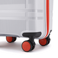 White small cabin suitcase wheel set with orange hub caps and corner base