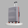 Grey large check-in suitcase with red wheel accents and side panel detail