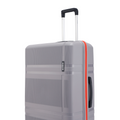 Gray hard-shell suitcase with black top handle and red-trim side zipper edge.