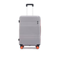 Grey medium check-in suitcase with telescopic handle and corner wheels, front close-up